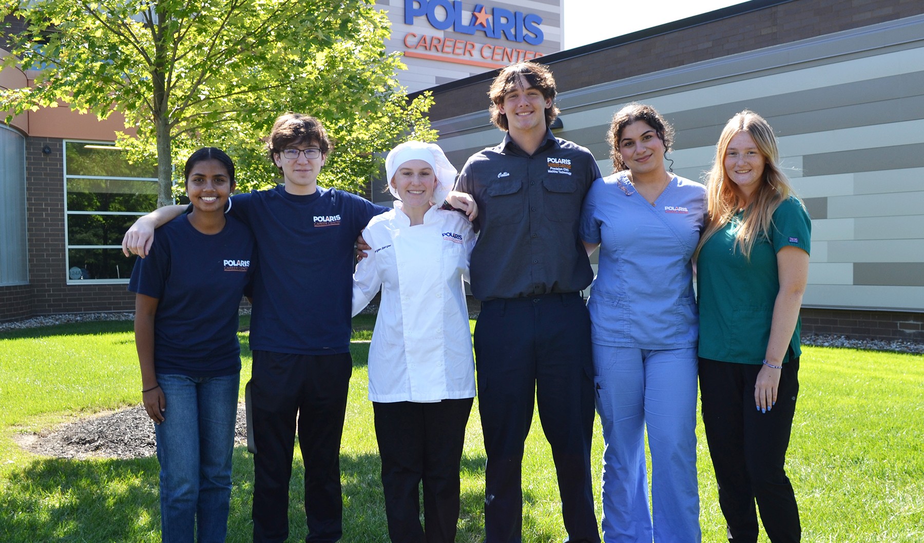 Polaris Learning Center Welcomes Students: Student ambassadors stand outside the modern Polaris Career Center building, symbolizing a welcoming and career-focused learning environment.