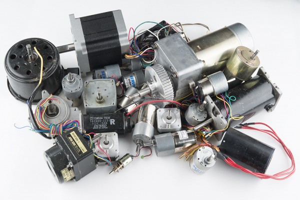 Close-up of various types of electric motors showcasing different sizes and designs