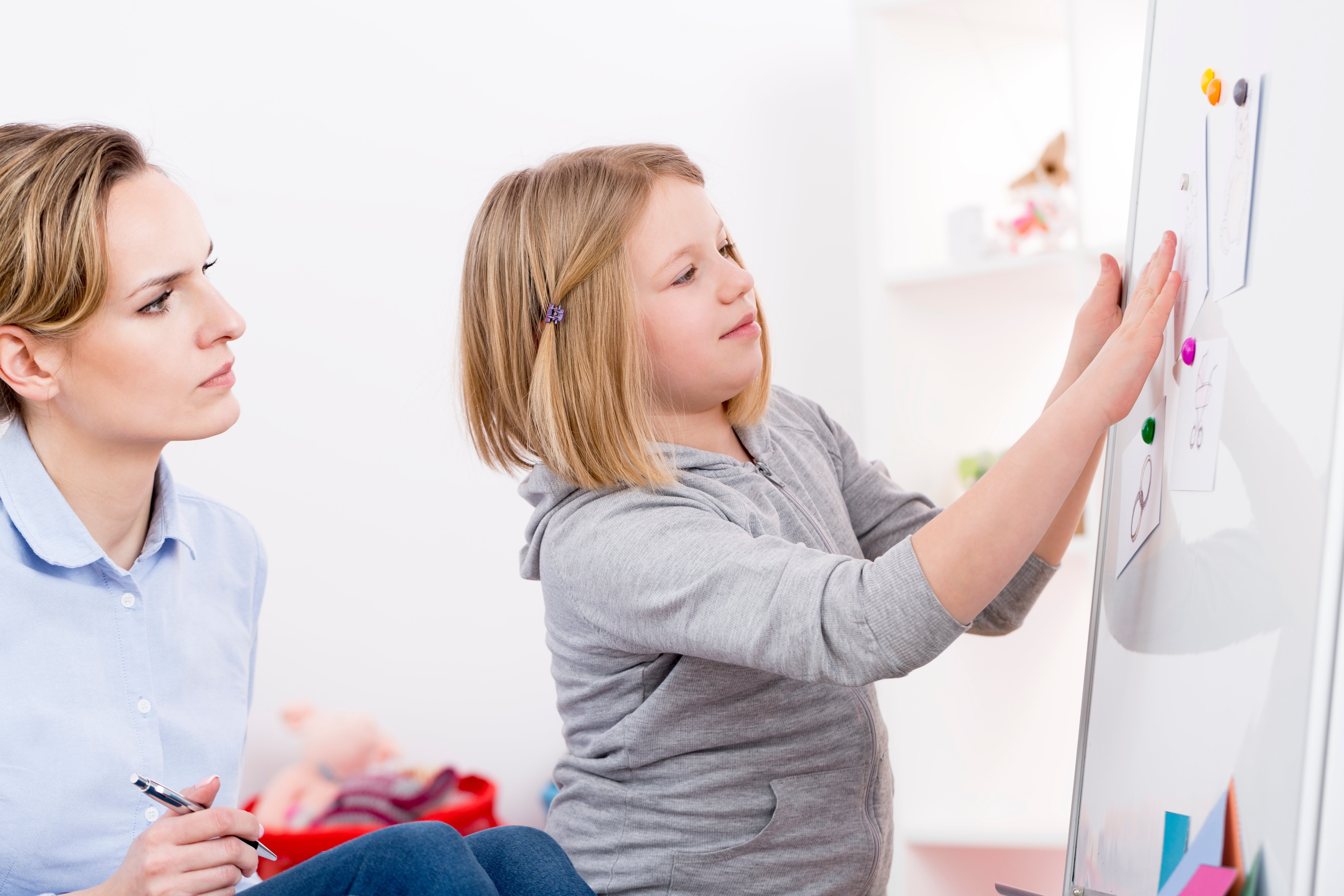 Child engaged in play therapy session at ABA center