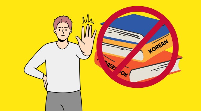 A man doing a stop gesture and a stack of books with the stop sign on top