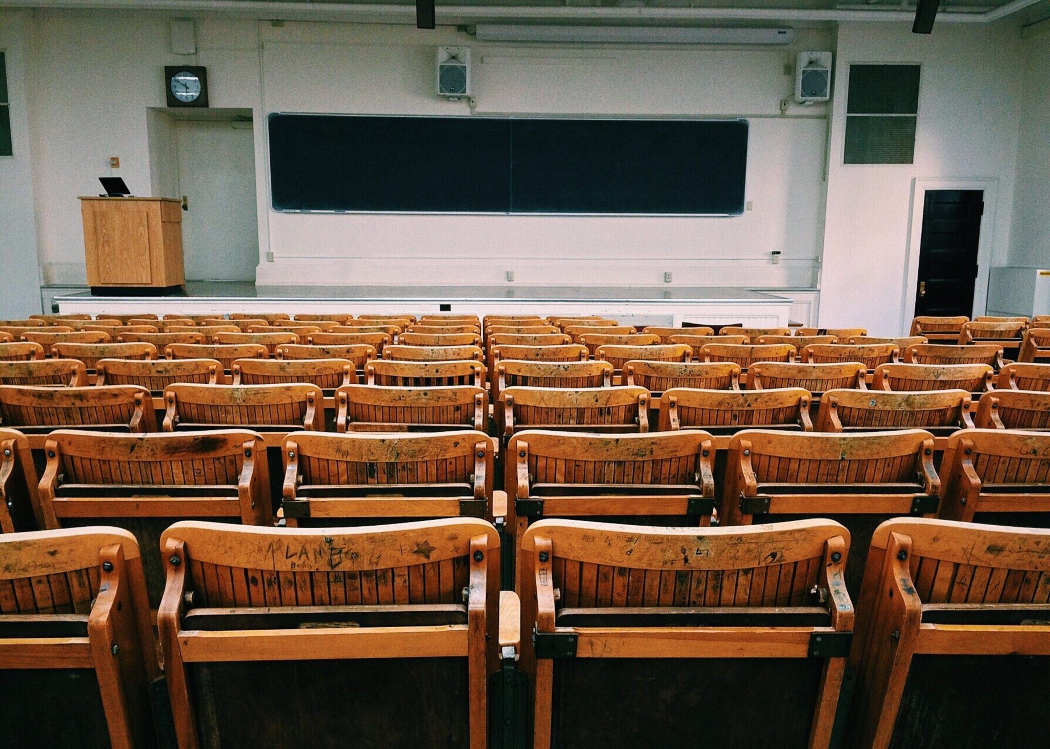 Empty lecture hall, symbolizing the limitations of formal language learning