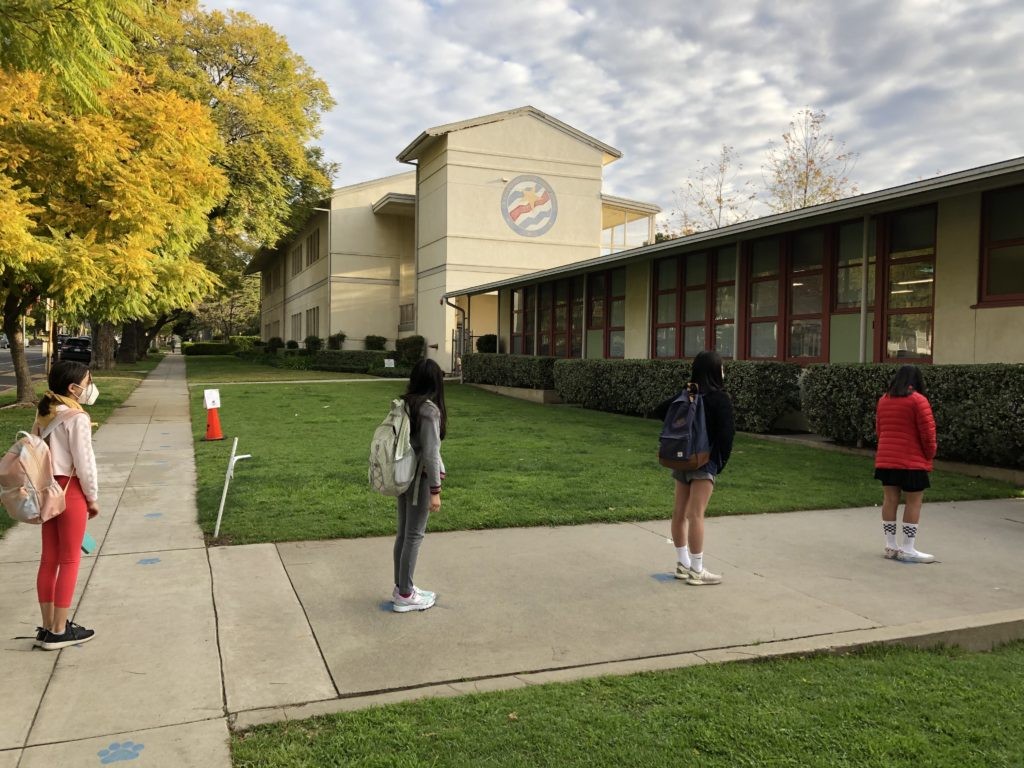 Students excitedly return to school after pandemic closures, ready for zingy learning experiences.