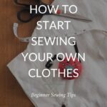 Sewing machine and essential sewing supplies for beginners, including fabric scissors, pins, measuring tape, seam ripper, chalk, and an iron.