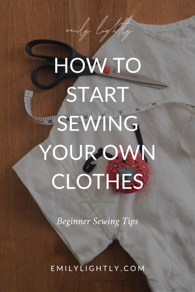 Sewing machine and essential sewing supplies for beginners, including fabric scissors, pins, measuring tape, seam ripper, chalk, and an iron.