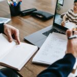 A teacher talks to a student online using distance learning tools