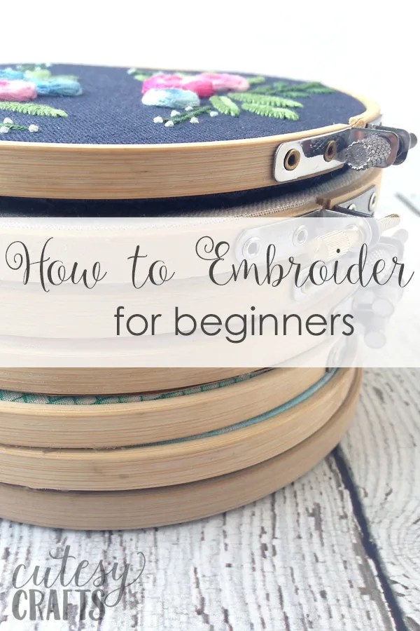 Embroidery supplies for beginners laid out on a table