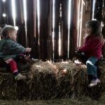 Children joyfully exploring nature at Learning Tree Farm