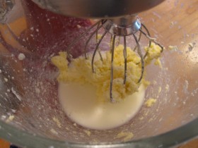 Transforming Cream into Butter: A Cool Culinary Skill to Learn - See how whipping cream changes into butter and buttermilk in a kitchen mixer.