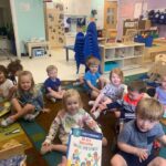 A cheerful classroom scene at Holly Springs Learning Center, showcasing bright colors and engaging learning materials.