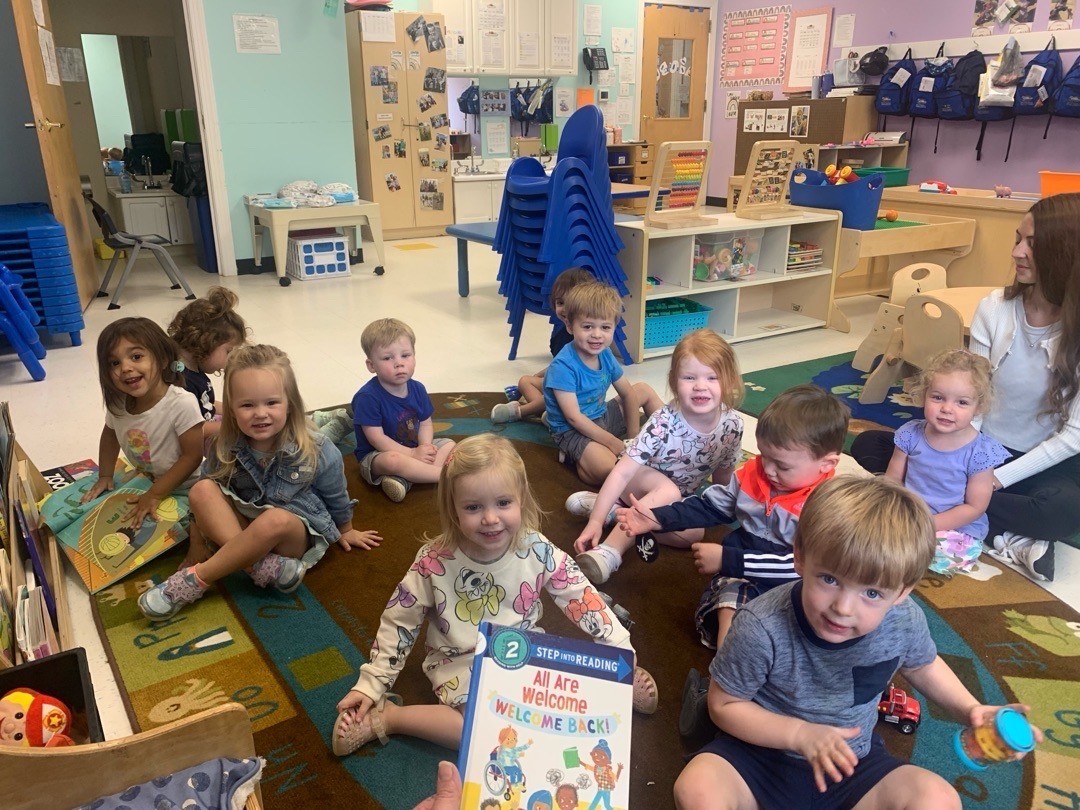 A cheerful classroom scene at Holly Springs Learning Center, showcasing bright colors and engaging learning materials.