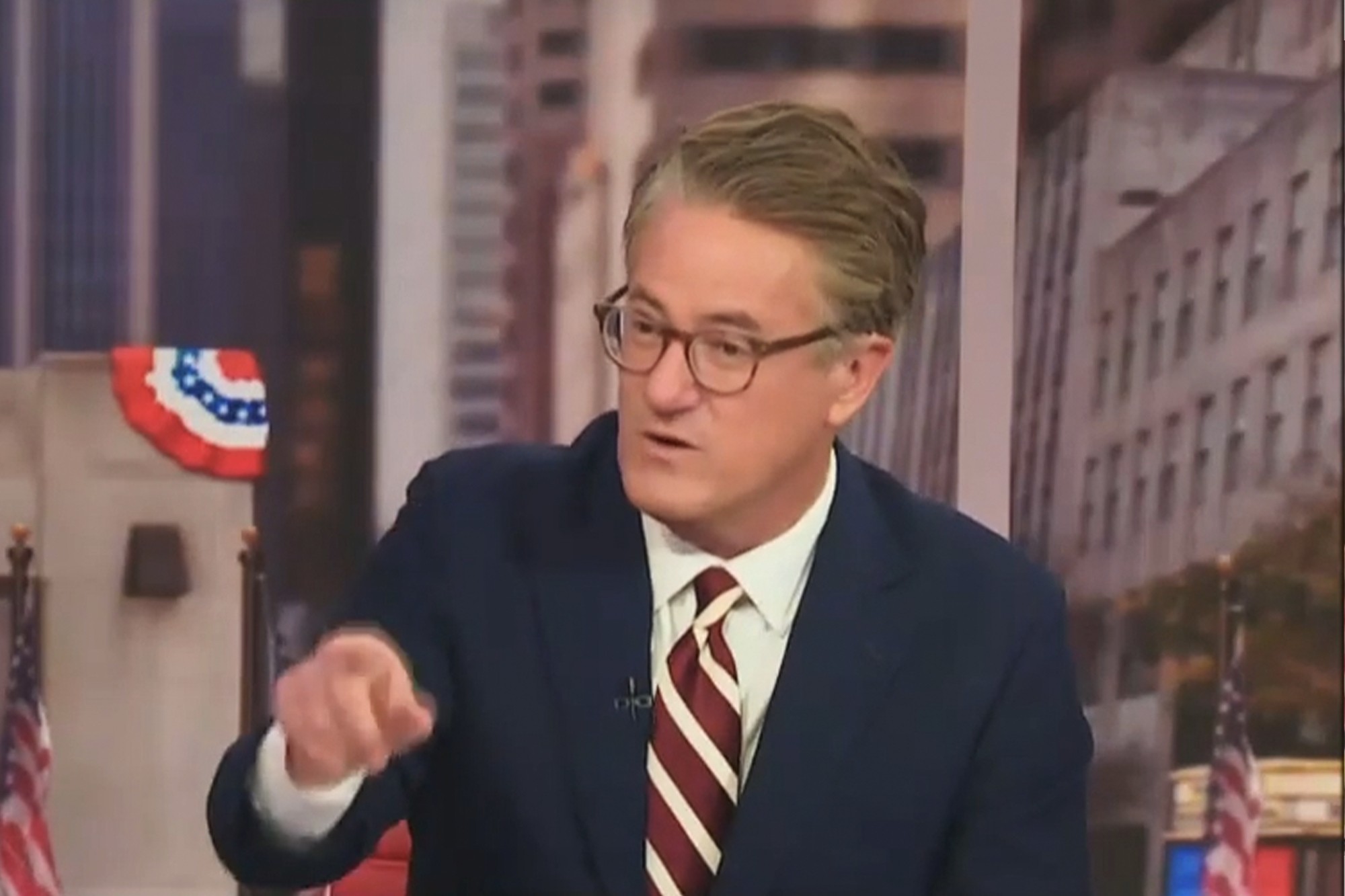 Joe Scarborough criticizing Democrats on television, highlighting political commentary and economic discussions