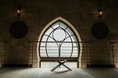 A person reading the Quran, symbolizing the journey of learning to read Quran and connecting with the holy book.