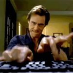 Jim Carrey typing as God in the film Bruce Almighty