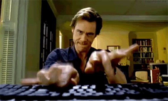 Jim Carrey touch typing furiously as God in Bruce Almighty