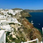 Santorini's iconic shoreline attracts visitors eager to learn about Greece's stunning landscapes.