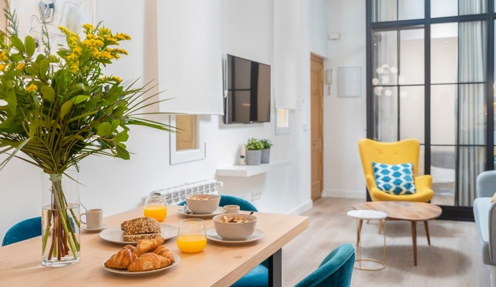 Group of diverse people in modern apartment