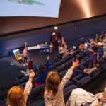 Audience members enjoying "Storytime Under the Stars" at the Challenger Learning Center Tallahassee