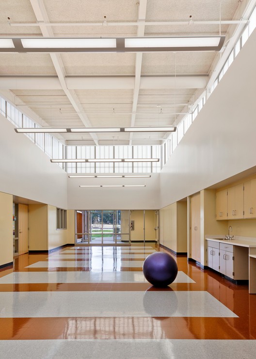 Interior perspective of Brokaw Early Learning Center showcasing the 9-foot horizontal design element and child-friendly scale