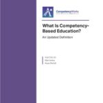 Report cover for 'What is Competency-Based Education? An Updated Definition' by Aurora Institute, illustrating the concept of competency-based learning in modern education systems.