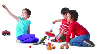 Children engaging in playful learning activities at a YMCA Early Learning Center, highlighting the nurturing environment for early childhood development.