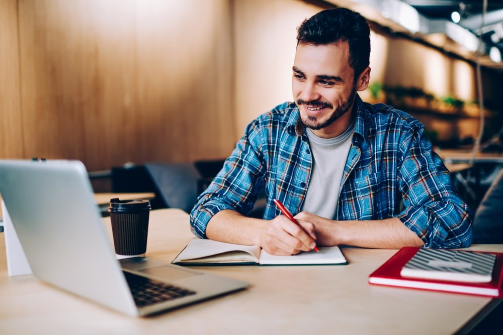 Man Studying Italian Vocabulary on His Laptop