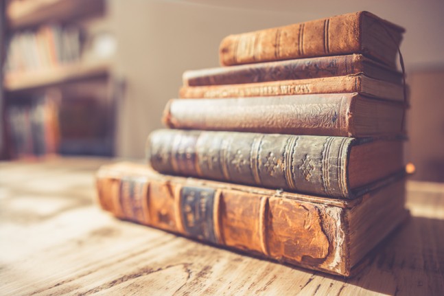 A selection of books that are a way to learn about antiques