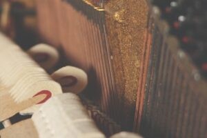 Close up of a piano with sheet music