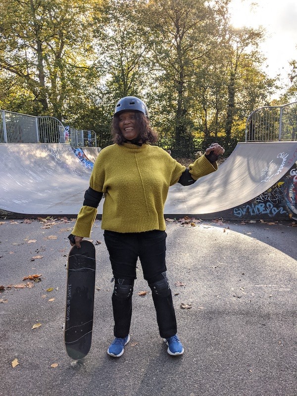 Skateboarder wearing protective gear