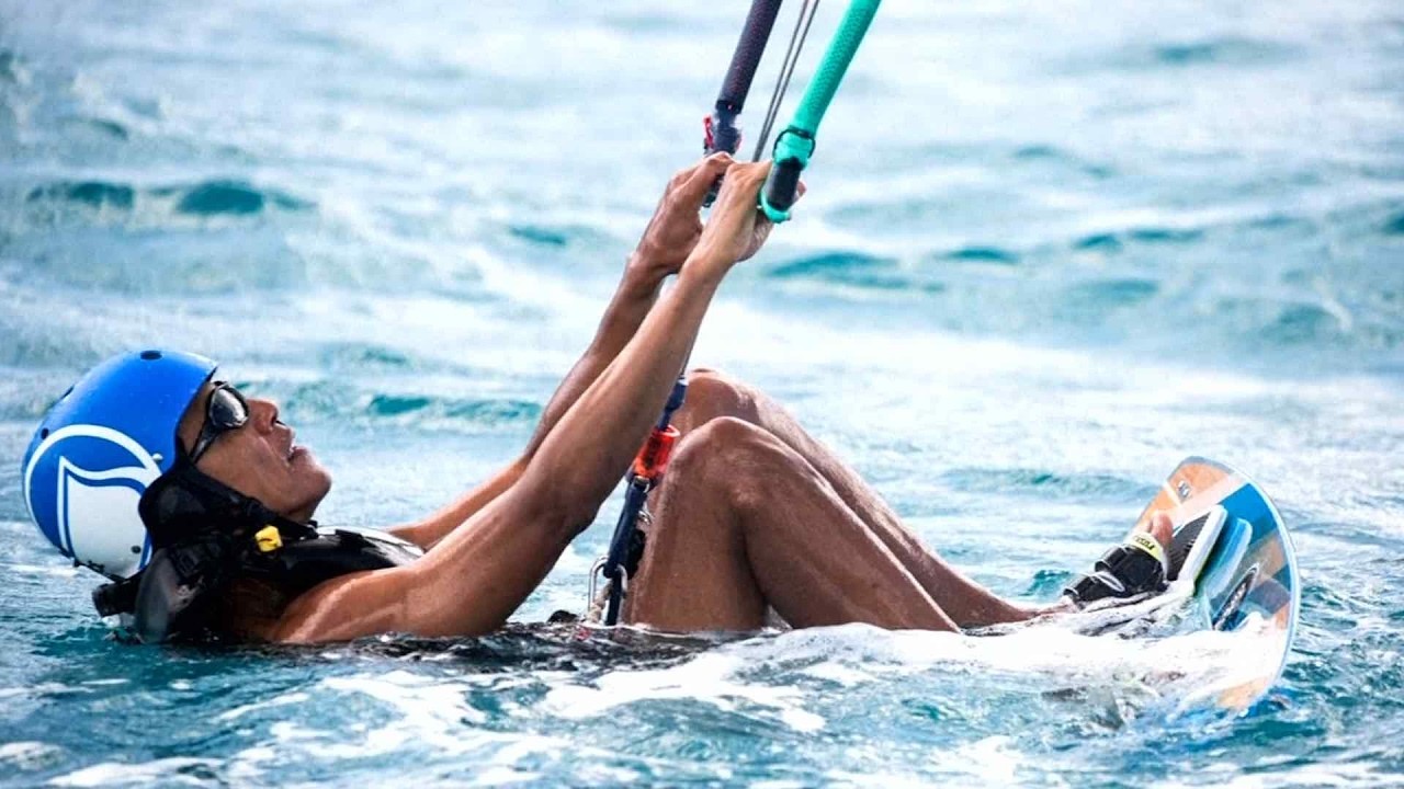 Kitesurfing and riding waves
