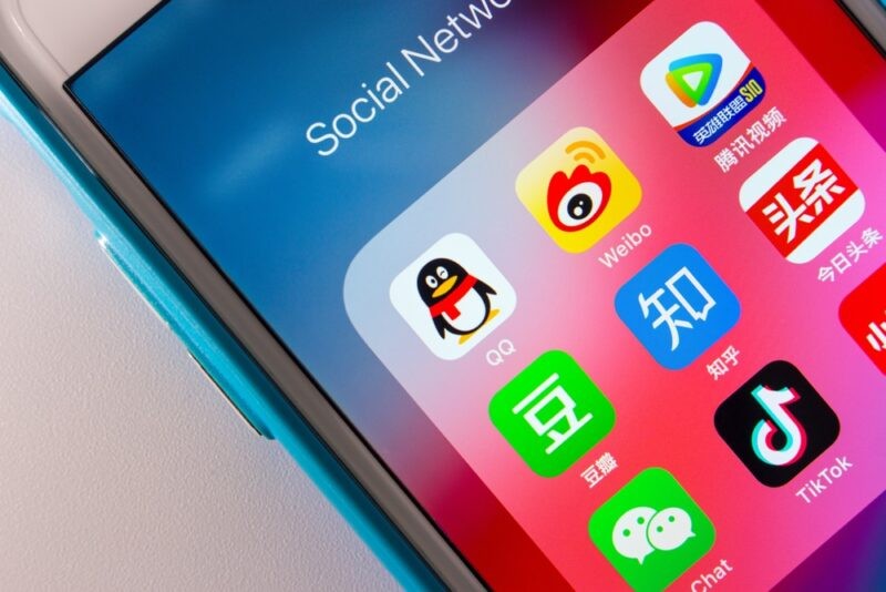 A person watching a video on a Chinese video-sharing platform such as Youku or Tudou, showcasing the unique digital content available in China