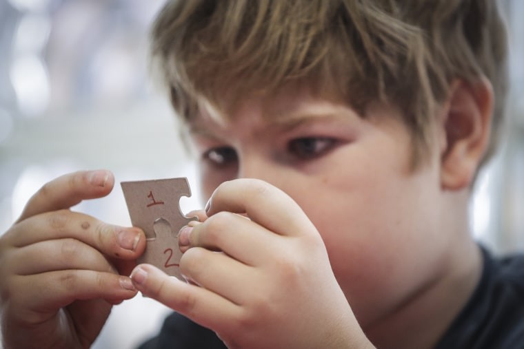 Kyle Gregory connects puzzle pieces at LearningRx.