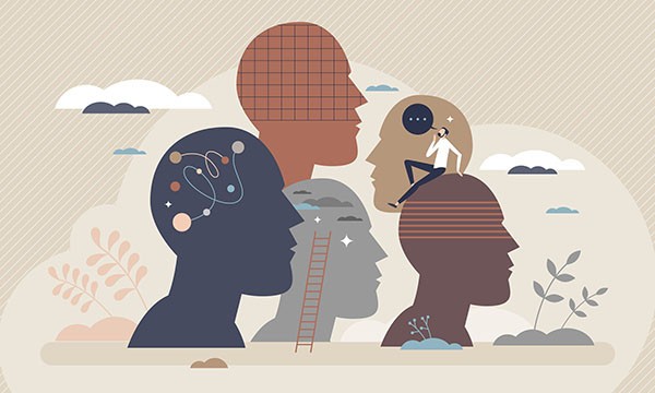 Silhouettes of heads with different patterns and shapes, indicating a diversity of thought