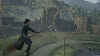Sitting on a broom during flying class in Hogwarts Legacy
