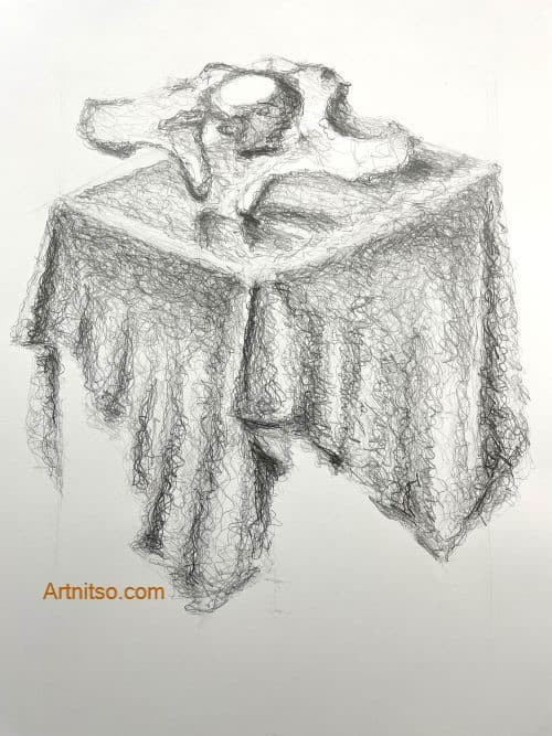 Close-up of drawing hands with graphite stick on white paper