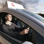 Driving instructor demonstrating proper motorway merging techniques