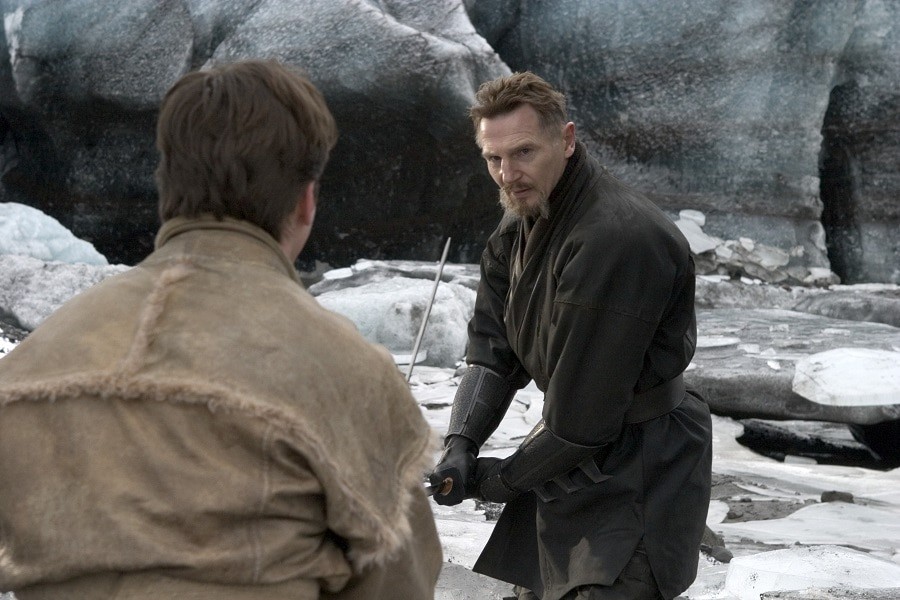 Ducard training Bruce in the art of tracking, showcasing the intense and morally ambiguous methods used to pursue targets