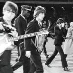 Harrison, Lennon (left) and McCartney (right) walk to the stage at Candlestick Park for the last show of their final tour, August 29, 1966