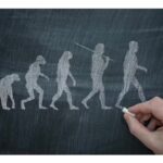 Early humans communicating through gestures and vocalizations.