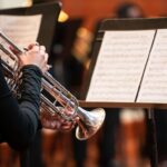 Trumpet student focused on sheet music