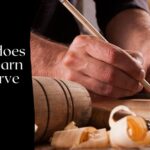 Sculpting tools on a wooden workbench