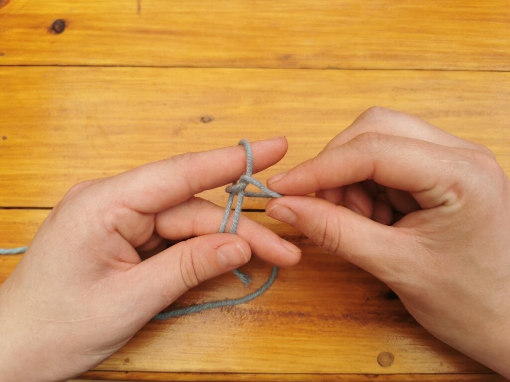 Pull the back loop off all the way.