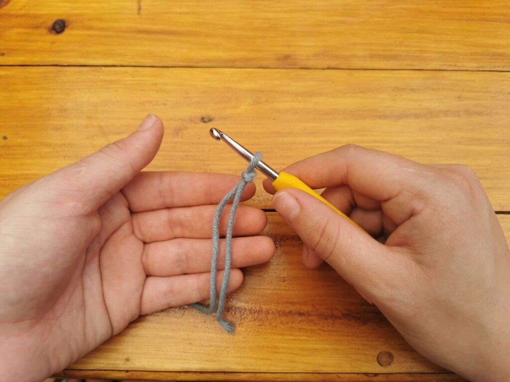 Tighten the slip knot on the hook
