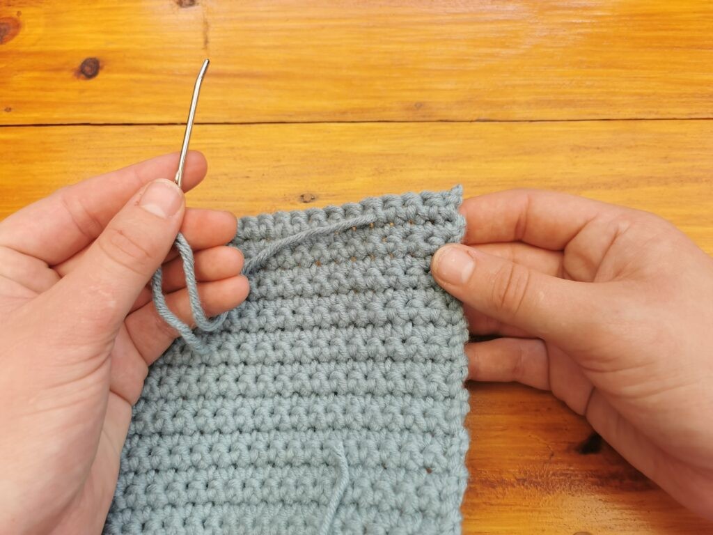 Pull through the yarn