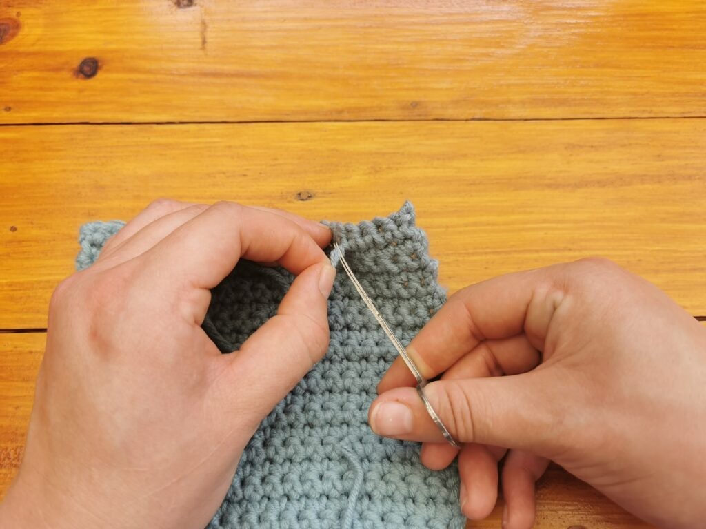 Cut the yarn close to the work