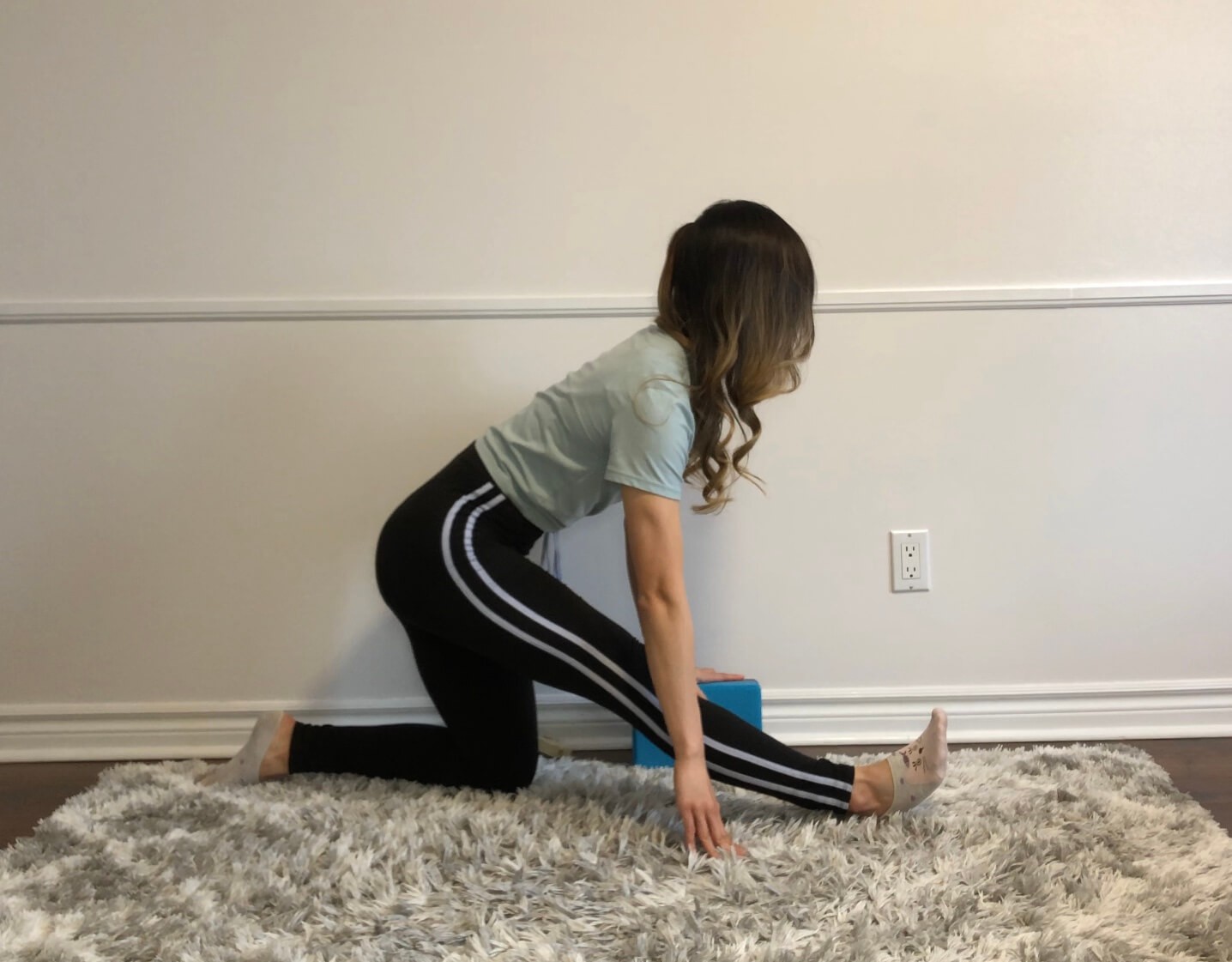 Half Split Hold to prepare for splits