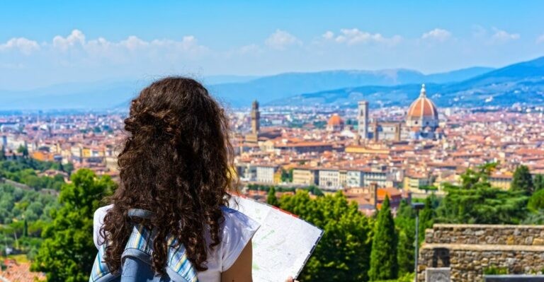 Girl looking out on Florence and pondering about italian dialects