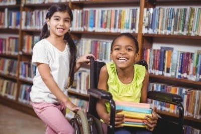 Child struggling with homework, representing learning difficulties in children with cerebral palsy