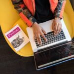 A person typing with speed and efficiency, showcasing the benefits of touch typing