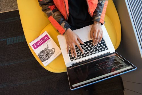 A person typing with speed and efficiency, showcasing the benefits of touch typing