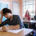 Inside a driving school, preparing students to pass their theory assessment